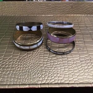 Lot of  6;Mother of Pearl bracelets. They are all slip on.